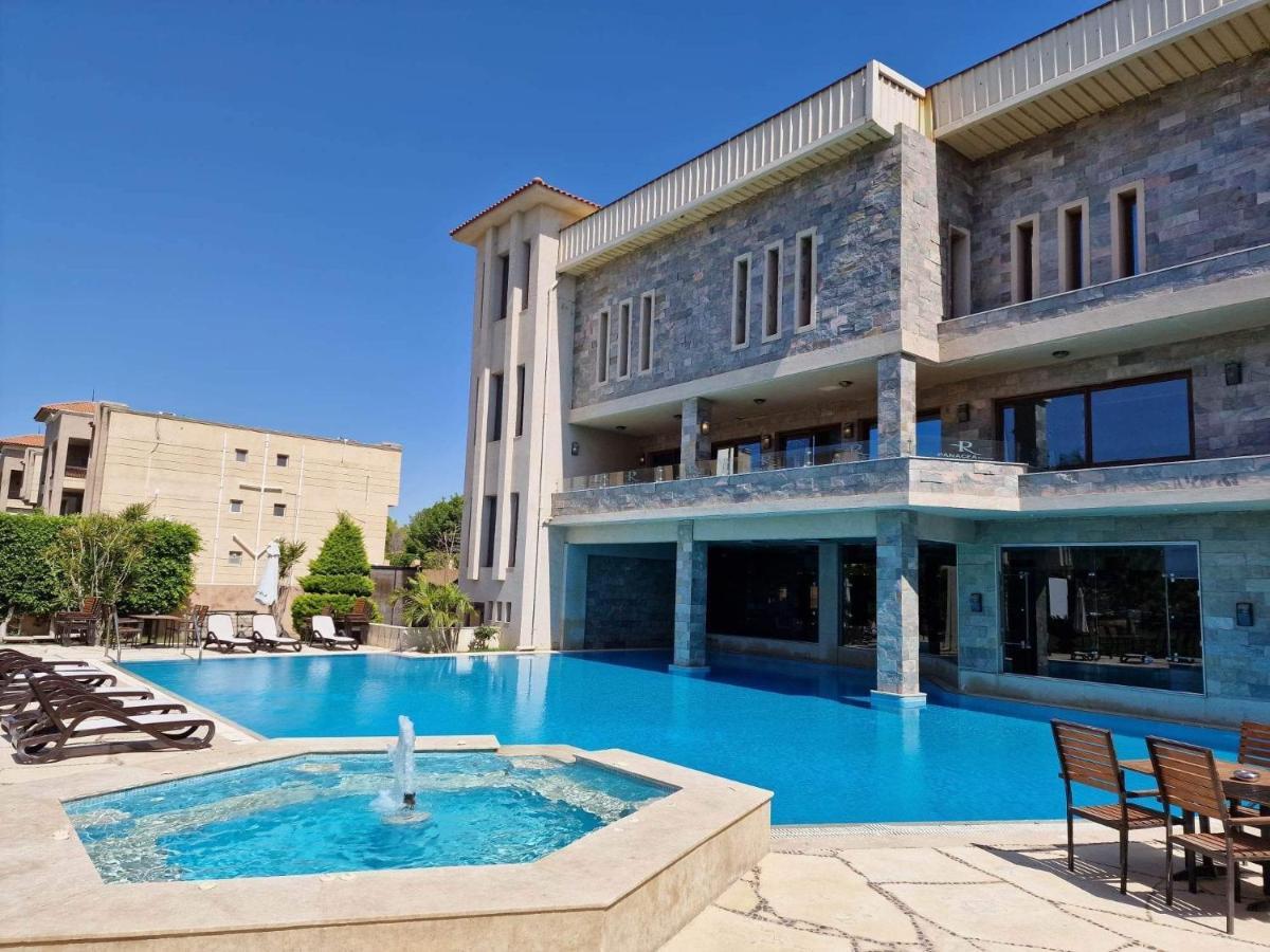 Panacea Suites Hotel Borg El Arab Exterior photo