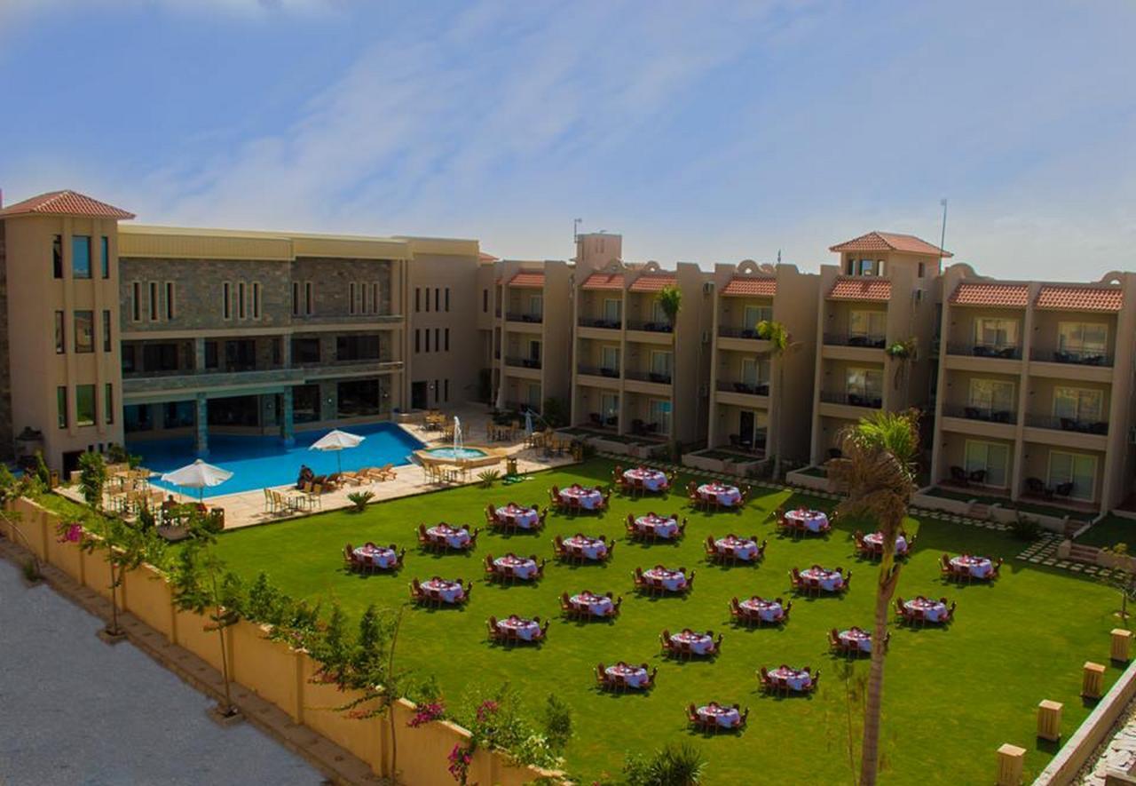 Panacea Suites Hotel Borg El Arab Exterior photo